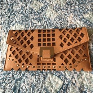 Camel color studded leather clutch